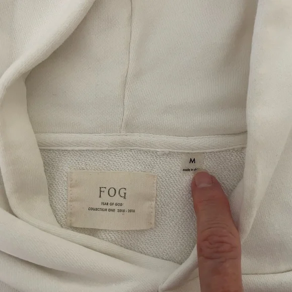 Fear of God FOG medium white short sleeve hoodie. Front pocket, side zippers.